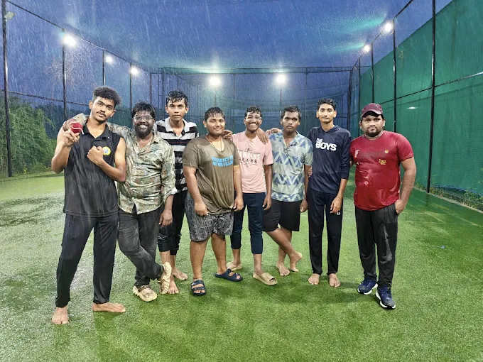 A drenched, happy crew after a monsoon game