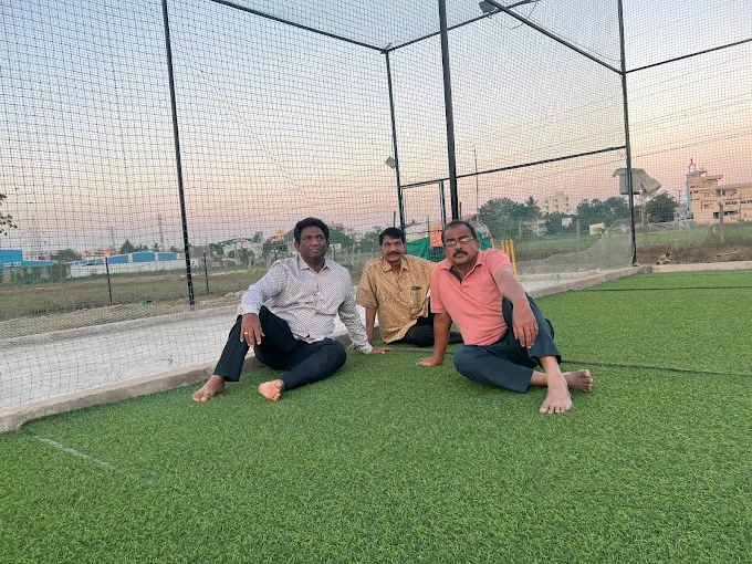 Regulars relaxing on the turf at sunset